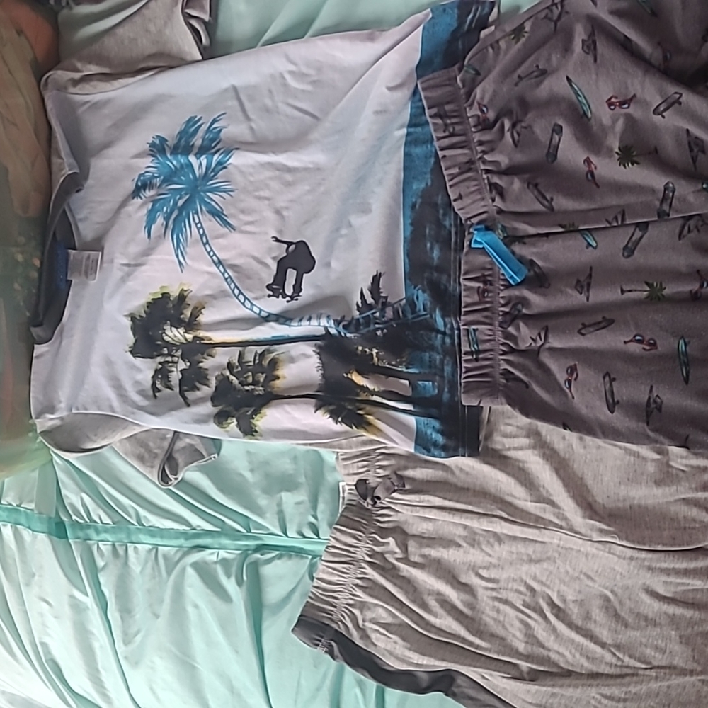 Boys size 14 Pajamas, skateboarding, includes top,shorts and pants